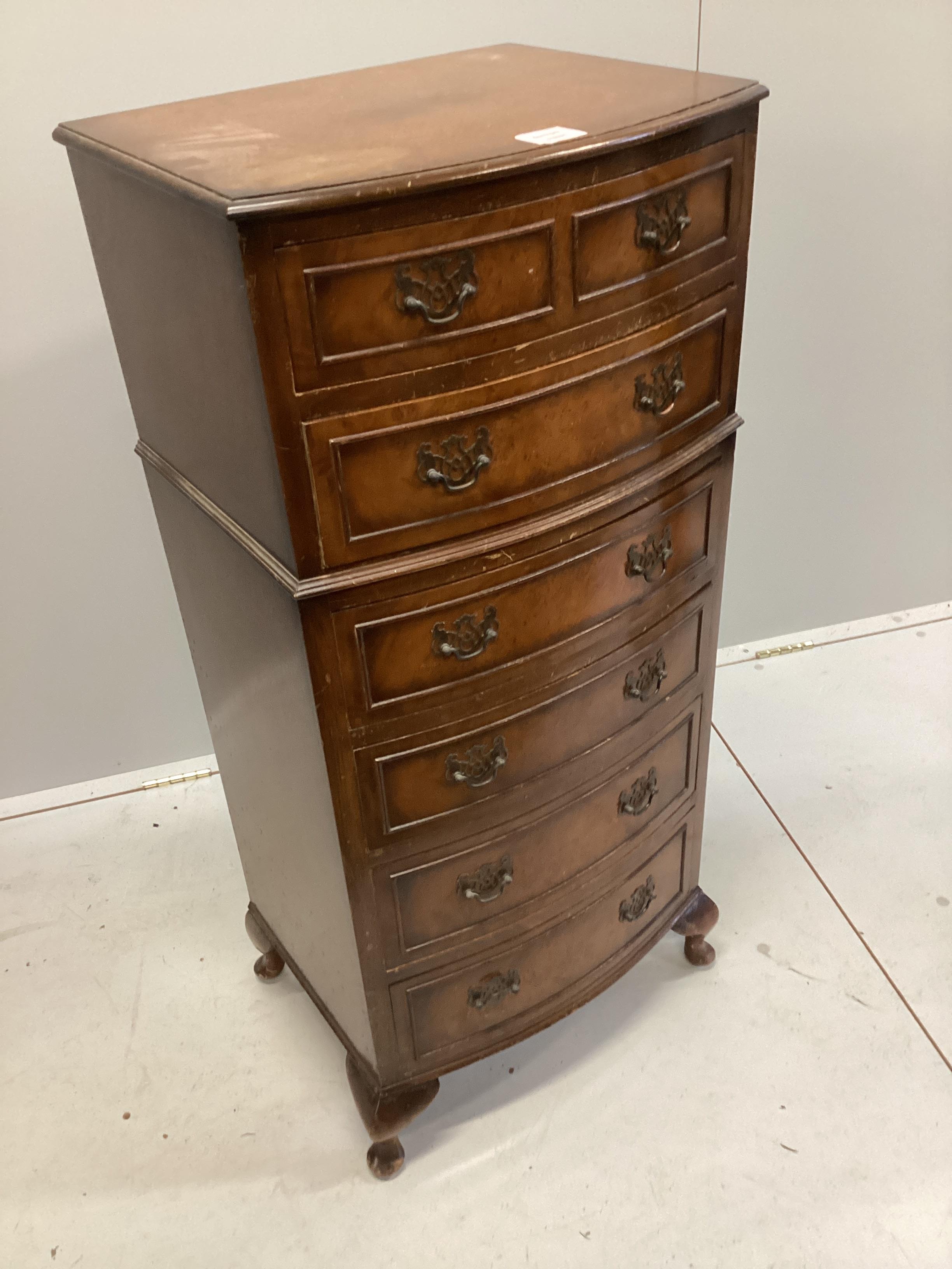 A reproduction walnut tall chest, width 48cm, depth 39cm, height 107cm